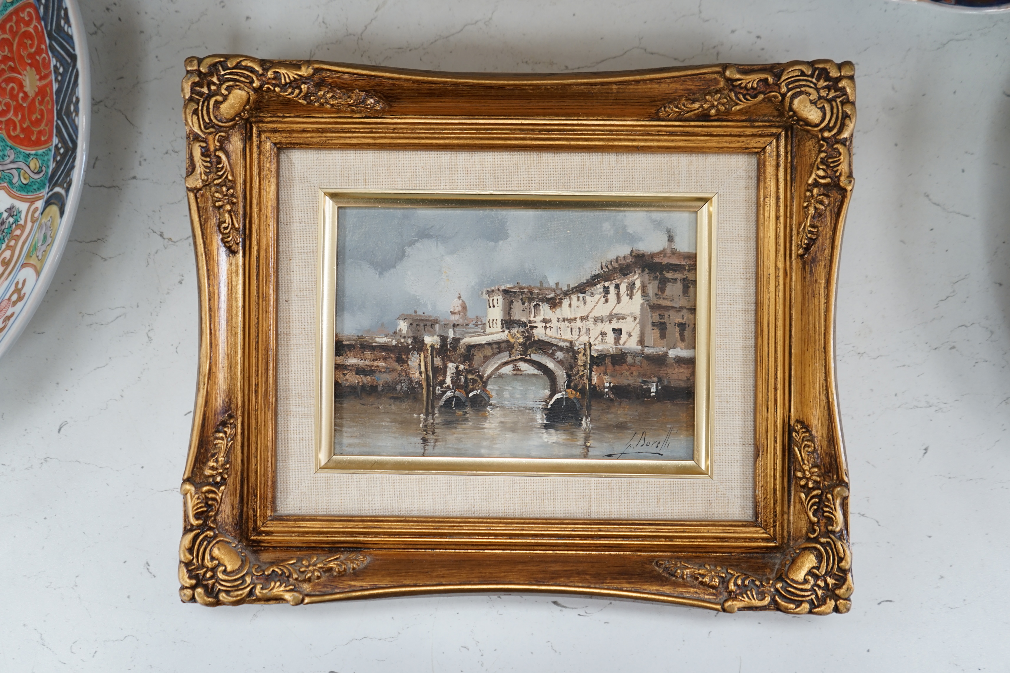 Guido Borelli (Italian b.1952), set of three oils on board, Italian views, comprising Venetian canals and rural landscape, each signed, 11.5 x 16.5cm, ornate gilt framed. Condition - good